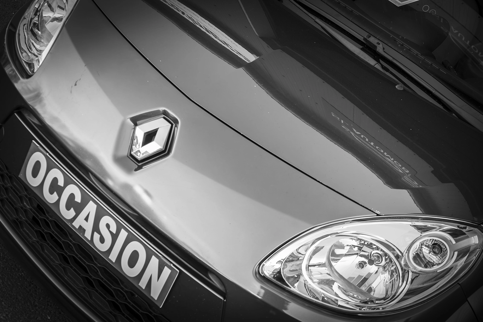 détail carrosserie Renault voiture d’occasion